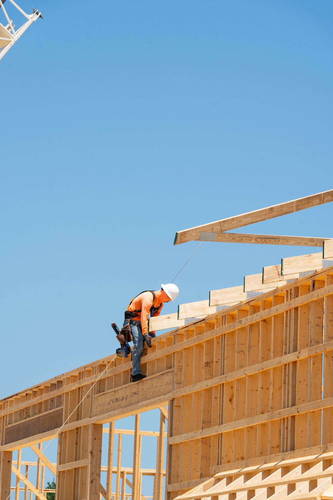 Construction worker building a Divine Premium Flex Space suite